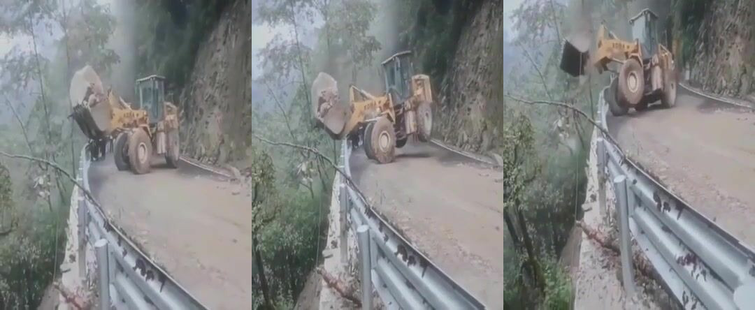 Bulldozer takes sharp turn and loses its bucket