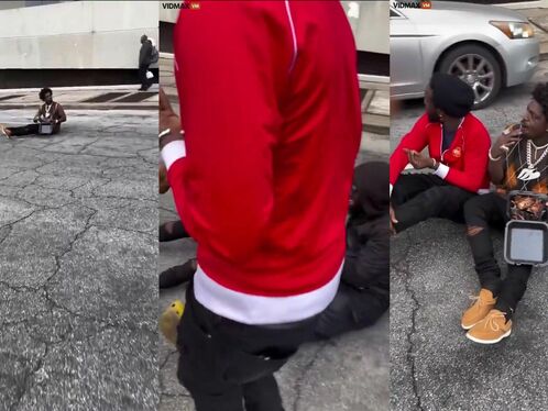 Rapper Kodak Black Sitting On The Street Eating