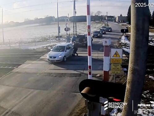 Passersby Rescue Vehicles Stuck On Tracks