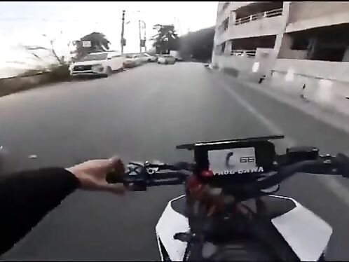 A Fool On A Motorcycle Crashed Into A Parked Car