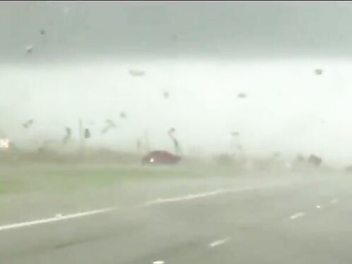 The Video Shows A Pickup Truck Being Overturned By A Tornado.