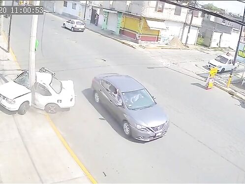 Car Crashes Into Utility Pole