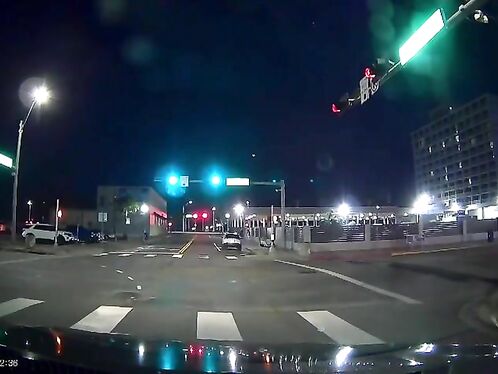 He Glanced At Us As He Drove By, Instead Of Looking At His Own Red Light O-01.