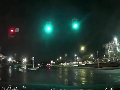 For Some Unknown Reason, The Car Ran A Red Light And Sped Away.