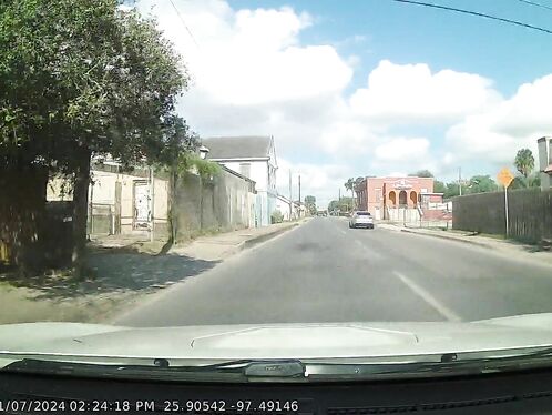 This Is A One-way Street, And Another Car Is Turning Left From The Right.