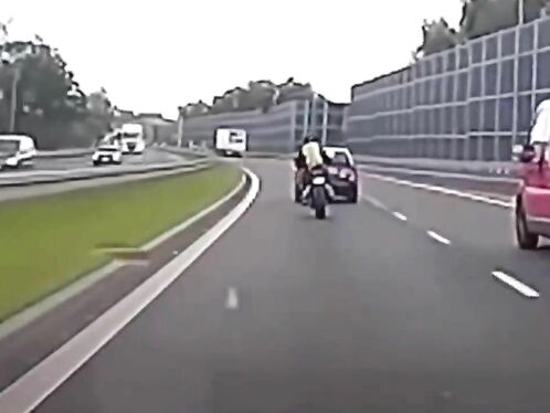 Reversing! â€” A Car Deliberately Rammed Into A Motorcyclist.