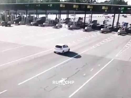 The Car Failed To Recognize The Toll Booth In Time And Crashed Into It.