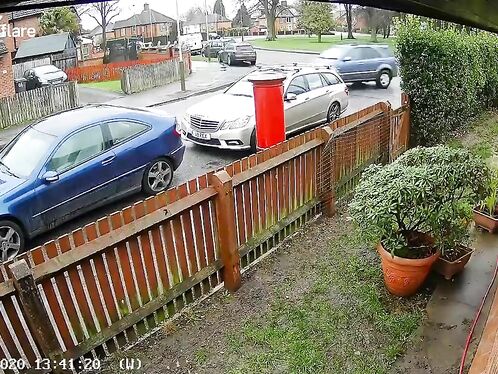 In Leicester, An Impatient Driver Sped Through The Gap Between Two Cars.