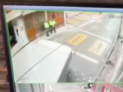 Two Police Officers Who Were Talking Were Run Over By A Turbocharged Car.