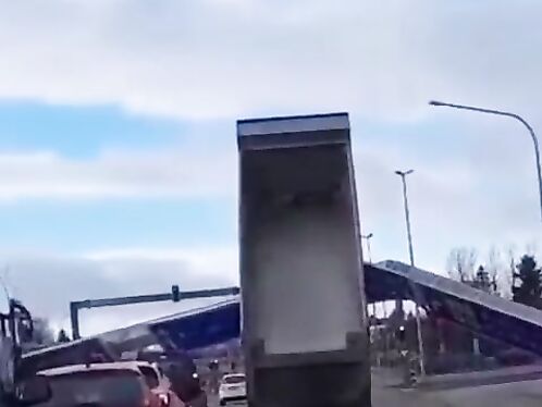 A Truck Crashed Into A Huge Traffic Sign.