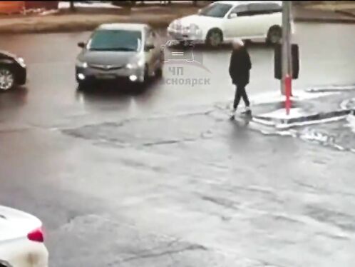 The Woman Narrowly Escaped A Car Collision.