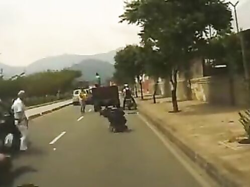 Chaos erupts as truck loses cargo onto busy street