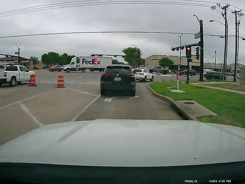 Driver runs red light and causes multi-car pileup