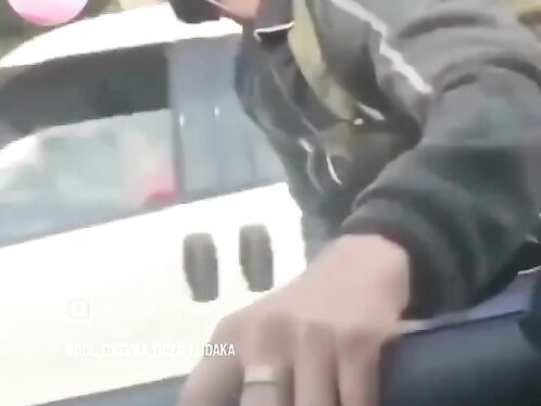 Driver films himself playing with his steering wheel while driving
