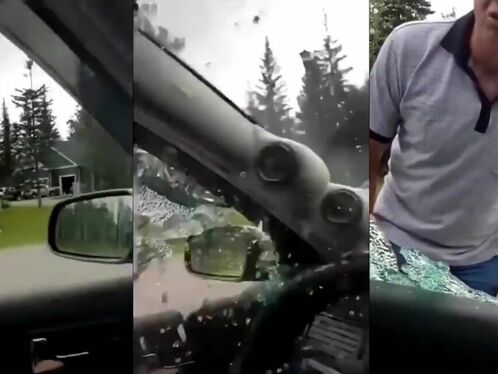 Man smashes his own car window with a hammer