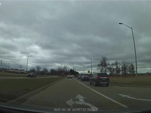 Driver ignores road markings and signs