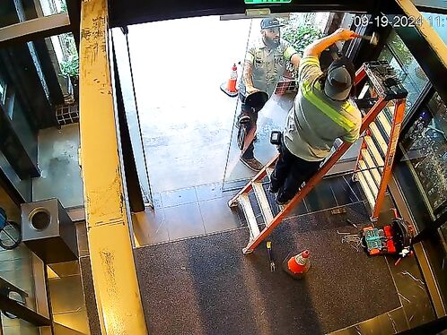 Worker slips while climbing ladder onto elevator