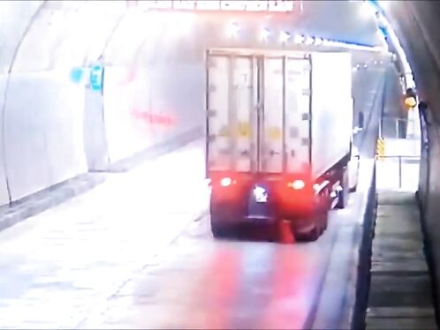 Car bursts into flames in snowy tunnel