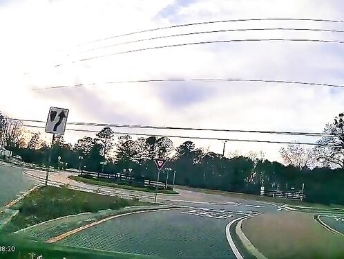 Driver crashes through barrier and rolls off the road