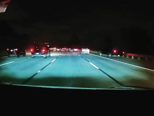 Driver swerves hard to miss object in middle of road