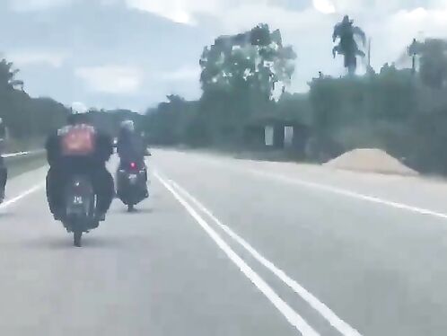 Motorcyclists take a bad fall on the highway