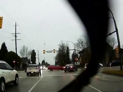 Red sports car causes three-car accident at intersection