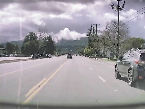 Driver films smoke-covered town and road after explosion