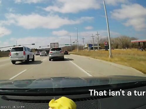 Car drives straight through an exit lane
