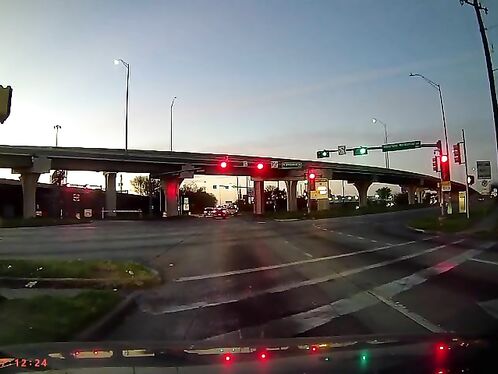 Driver runs red light and causes multi-car intersection crash