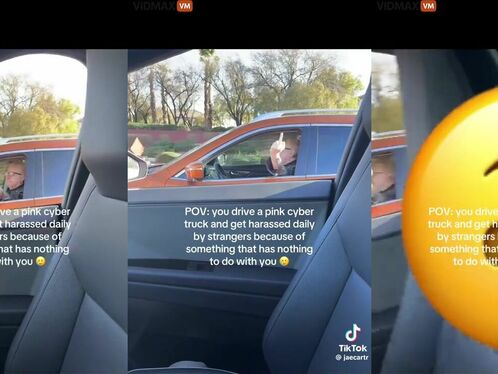 Man gives finger to woman in pink Cybertruck