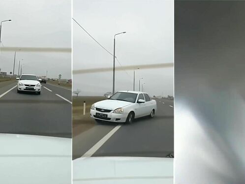 Car swerves to avoid head-on collision on country road