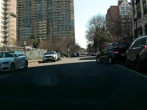 Driver approaches intersection and sees a red light