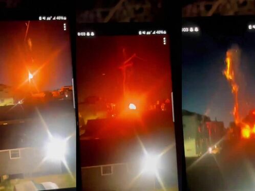 Massive fire engulfs building in middle of street
