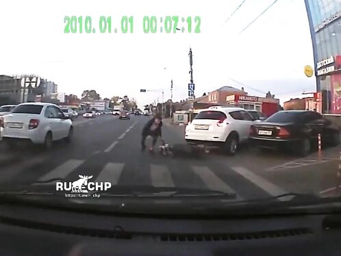Motorcyclist tries to weave through traffic and fails