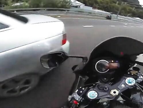 Blonde girl crashes motorcycle