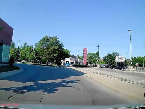 Car skids and crashes into a tree in parking lot