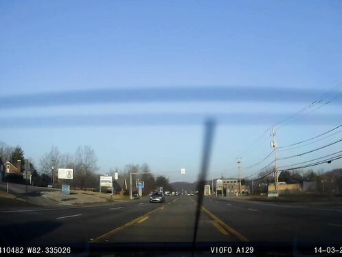 Car narrowly avoids a rear-end collision at intersection