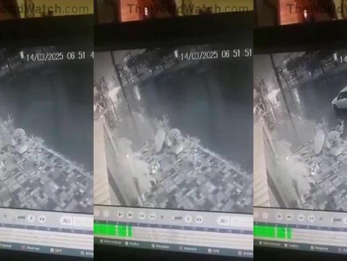 Car Drives Through Flooded Street Overhead