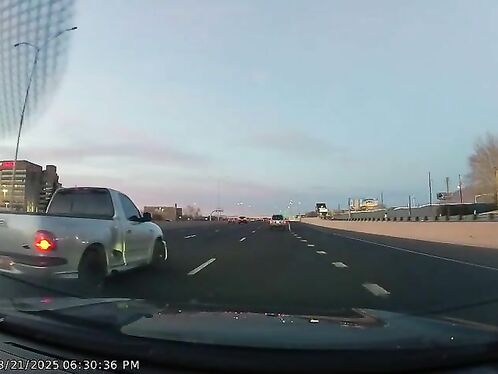 Pickup truck swerves and nearly collides on the highway