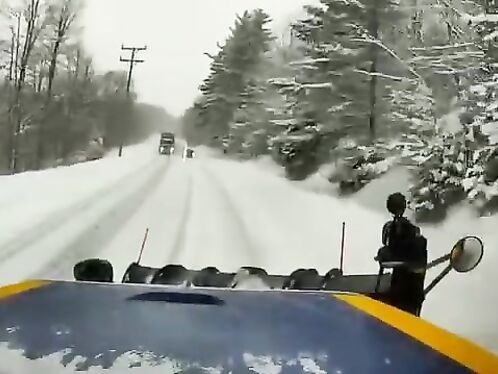 Driver attempts to pass tractor trailer on snowy road