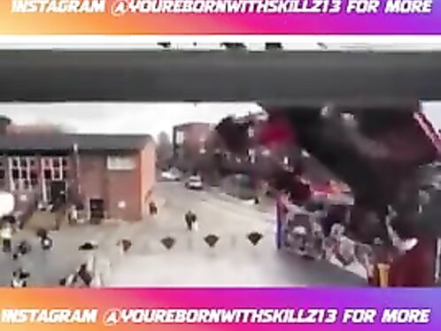 Massive truck crashes into buildings in a busy street