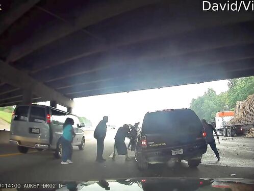Cars collide under highway bridge and burst into flames