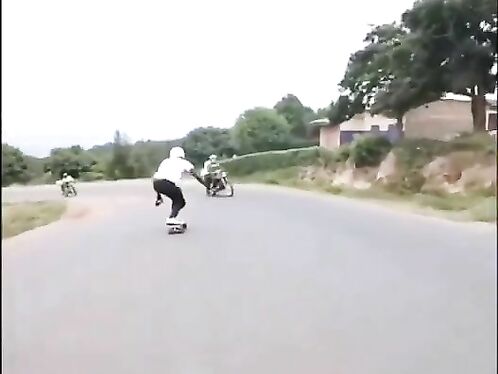 Skater hits motorcycle