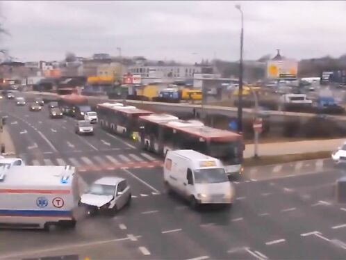 Large truck flips over on busy city street