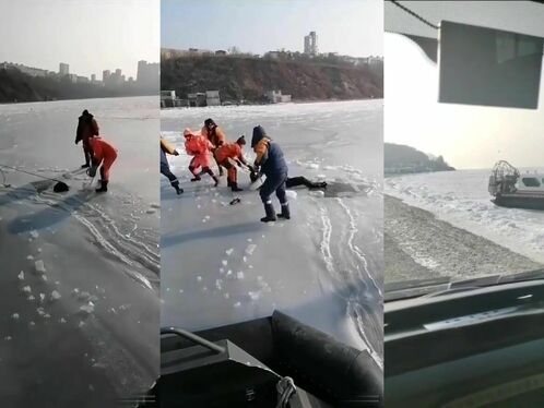 Car falls through ice as people struggle to retrieve it