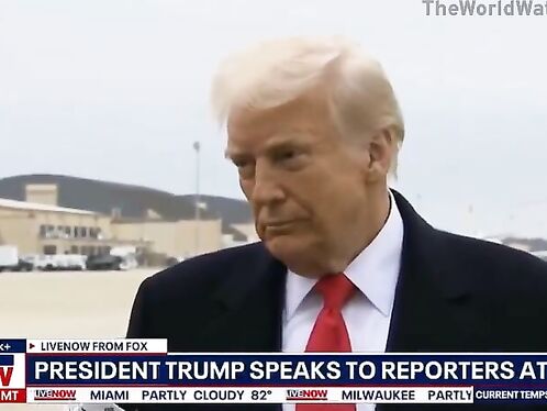 Trump hit with mic