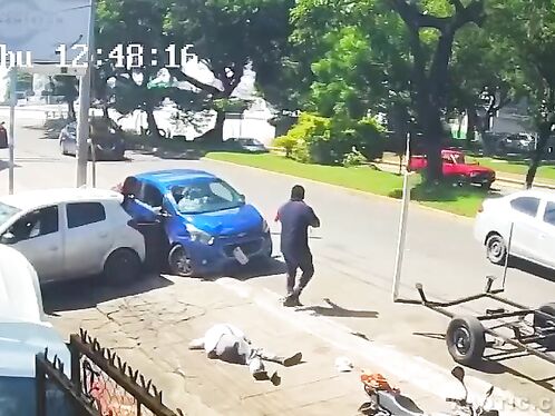 Man struck by car falls as drivers argue and fight