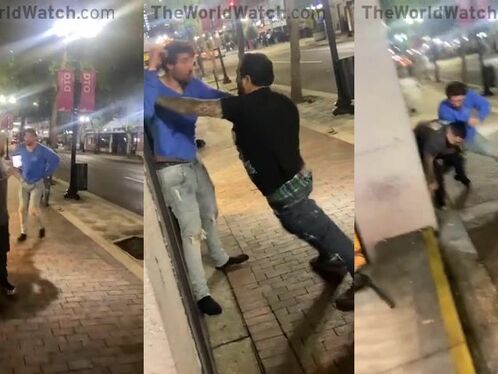 Man drags another man down steps in public
