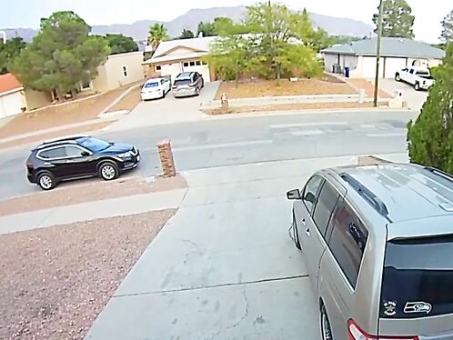 Motorcyclist crashes into car on residential street