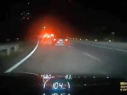 Driver swerves to avoid pileup on icy highway